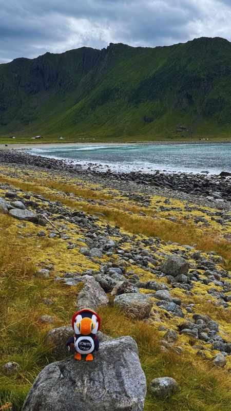 Unstad Beach, Northern Norway — Lofoten's surf beach — pale sand, black boulders, year-round Arctic waves and the operational home of cold-water surfing in Norway.